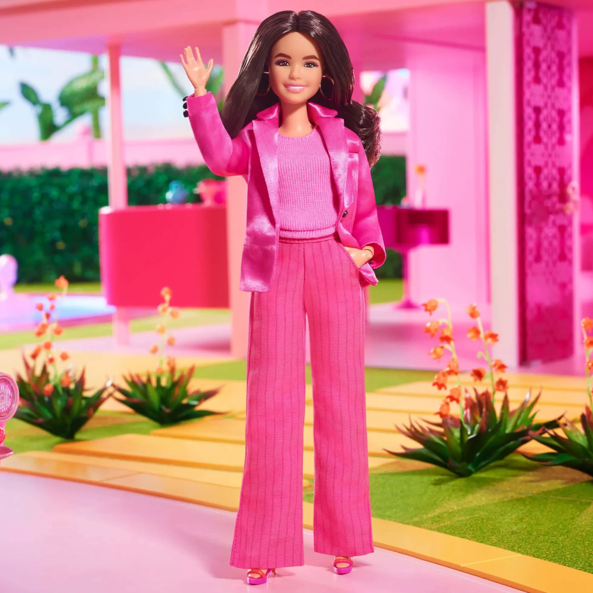 Gloria Doll Wearing Pink Power Pantsuit – Barbie The Movie