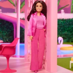 Gloria Doll Wearing Pink Power Pantsuit – Barbie The Movie