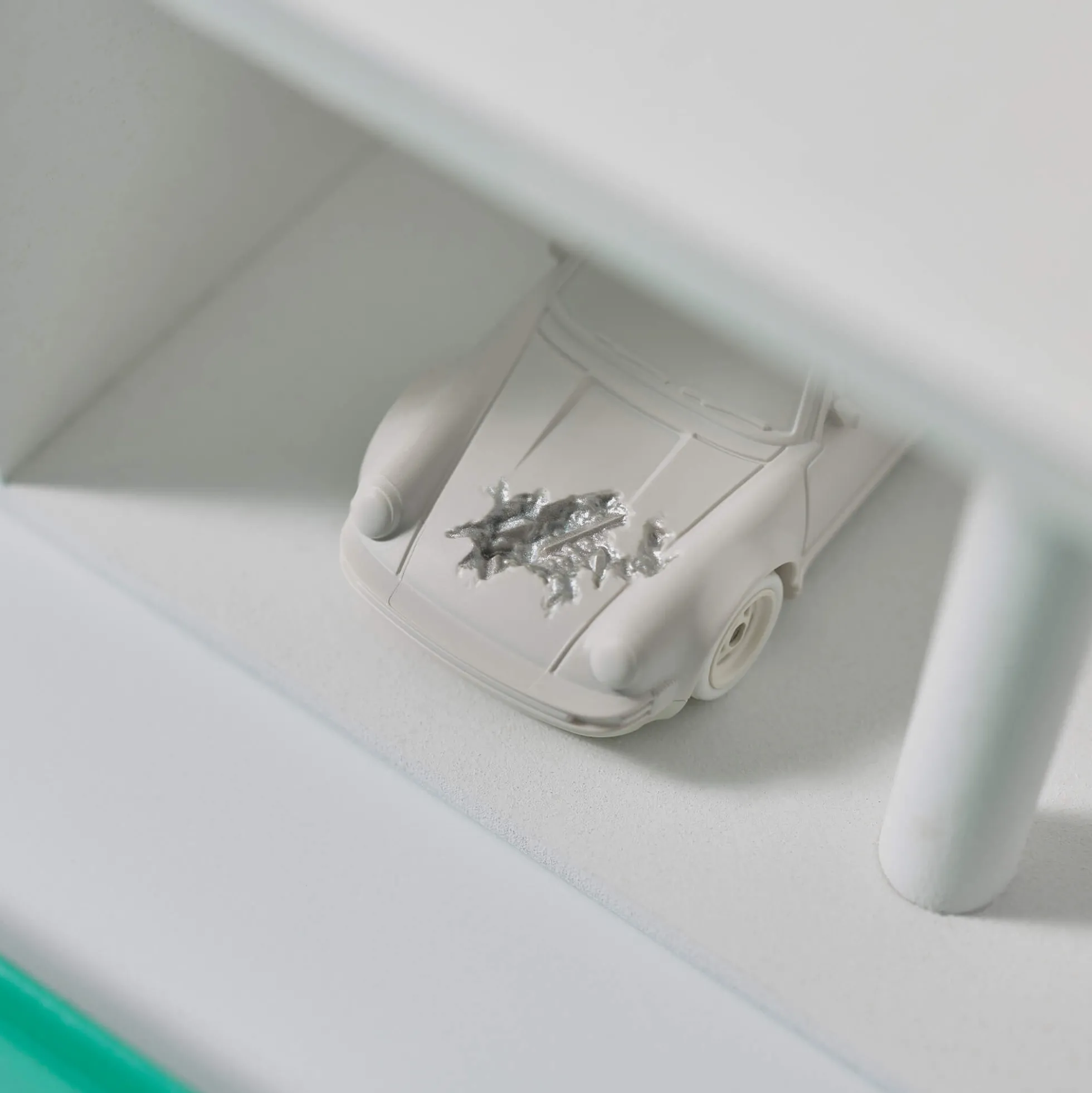 Hot Wheels x Daniel Arsham Eroded Porsche 930 and Rally Case