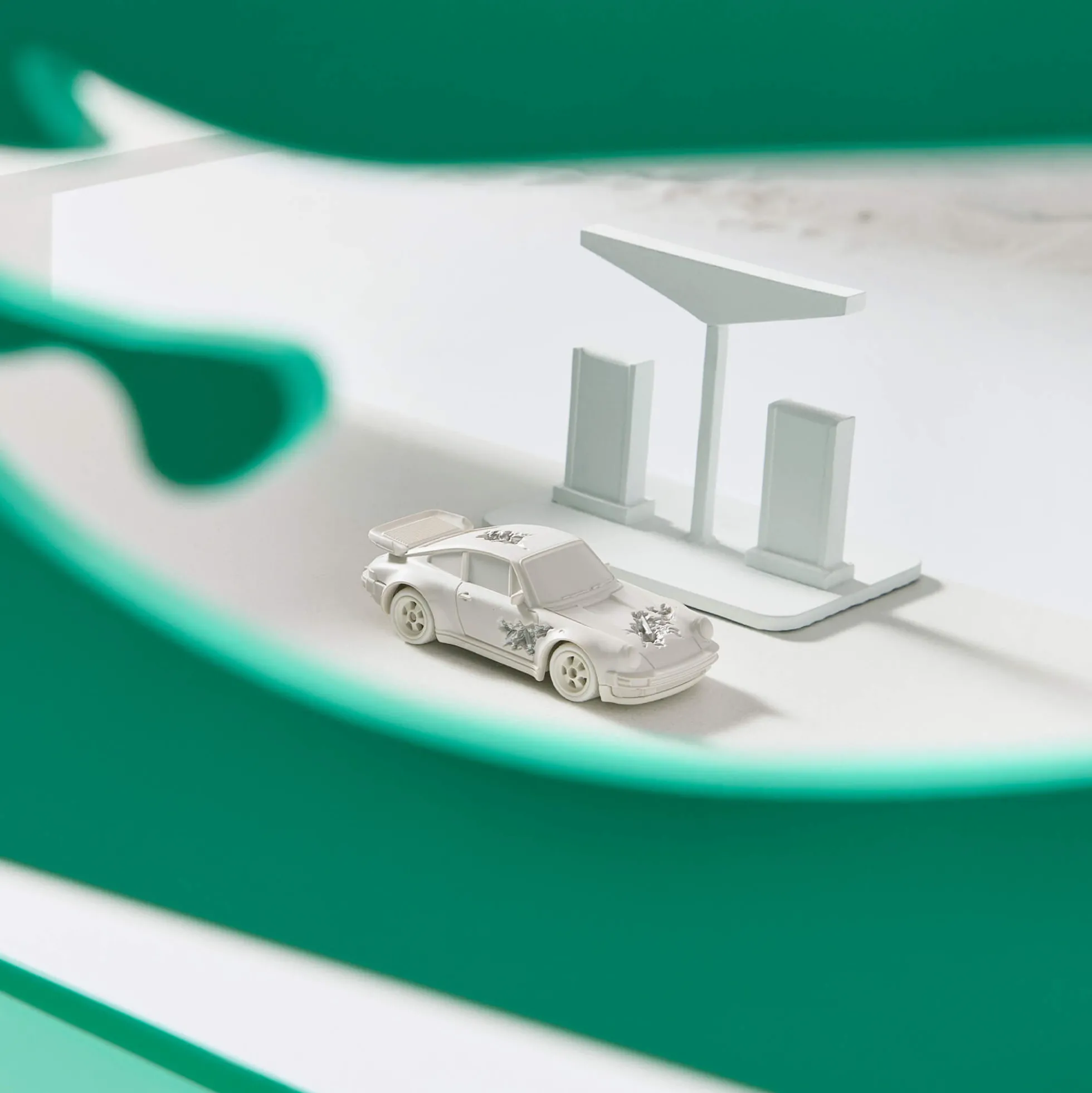 Hot Wheels x Daniel Arsham Eroded Porsche 930 and Rally Case