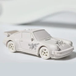 Hot Wheels x Daniel Arsham Eroded Porsche 930 and Rally Case