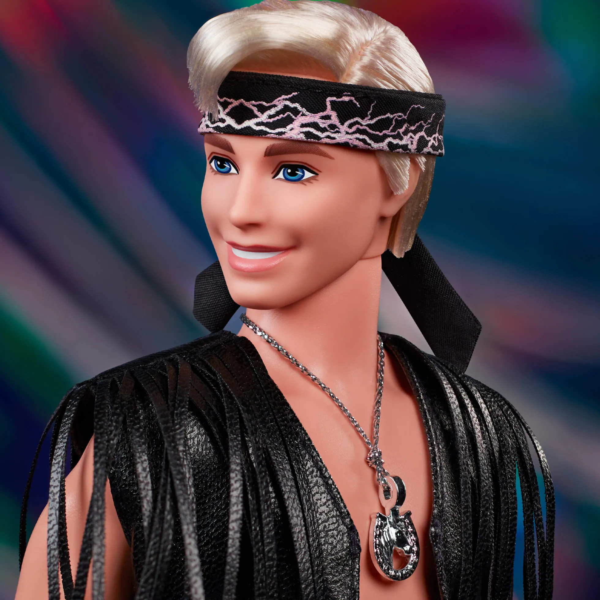 Ken Doll in Faux Fur Coat and Black Fringe Vest – Barbie The Movie